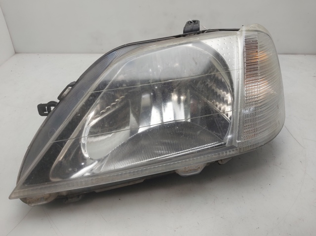 Reflektor lewy 8200211005 RENAULT