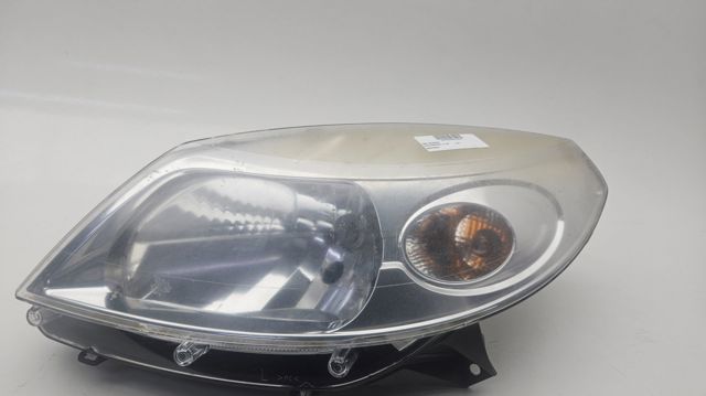 Reflektor lewy 8200733878 RENAULT