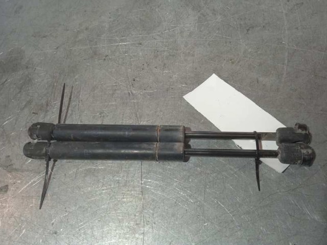 Amortyzator klapy bagażnika (3/5 drzwi-tylnych) 84430AV600 NISSAN