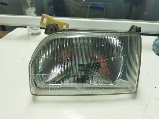Reflektor prawy 86AG13K060AA FORD