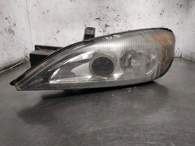 Reflektor lewy 89003044 NISSAN