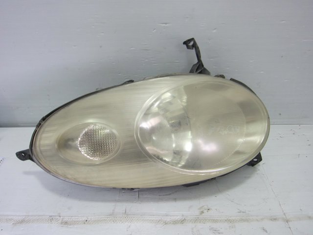 Reflektor lewy 89007101 NISSAN