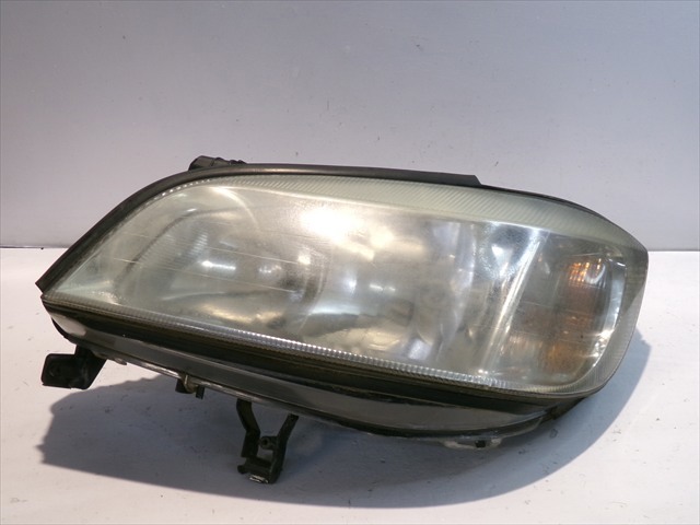 Reflektor lewy 89100054 OPEL