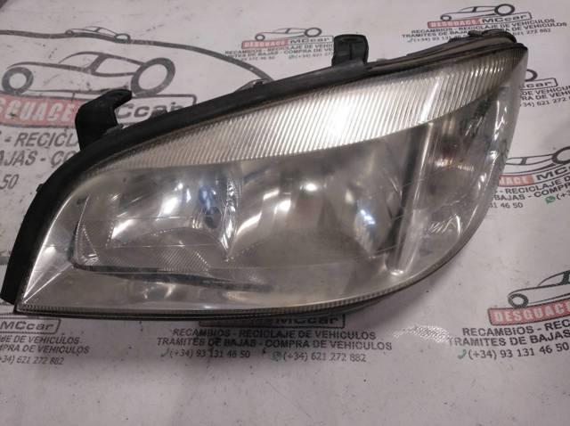 Reflektor lewy 89100054 OPEL