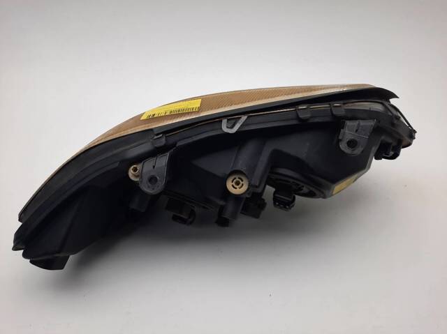 Reflektor lewy 89100054 OPEL