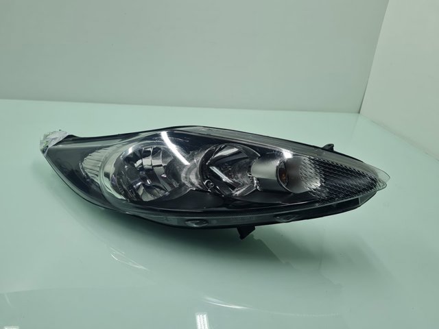 Reflektor prawy 8A6113W029AH FORD