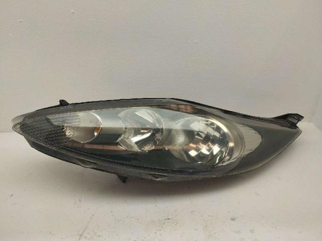 Reflektor lewy 8A6113W030AH FORD