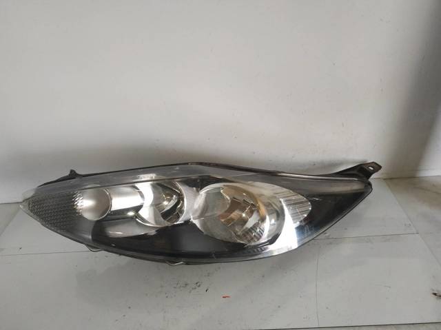 Reflektor lewy 8A6113W030AH FORD