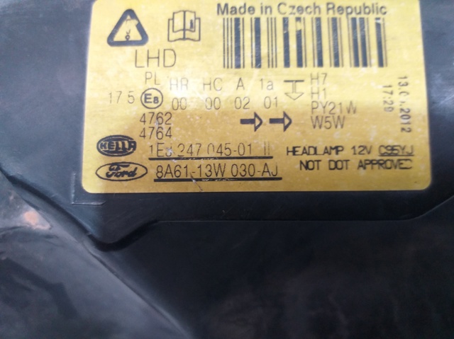 Reflektor prawy 8A6113W030AJ FORD