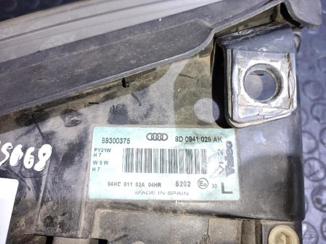 Reflektor lewy 8D0941029AK VAG