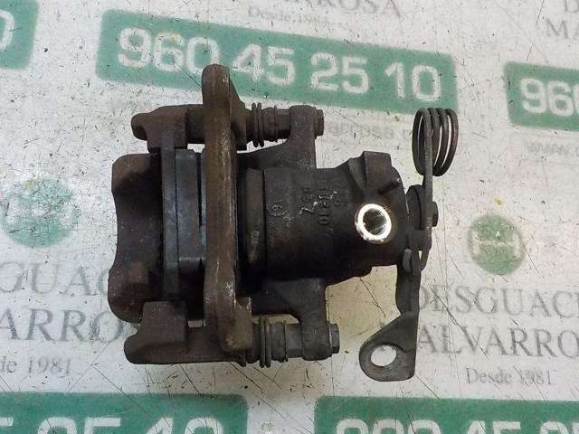 Zacisk hamulcowy tylny lewy 8E0615423 VAG