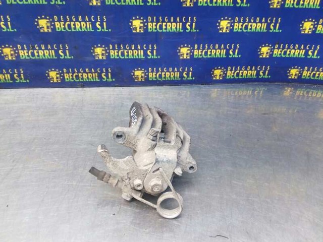 Zacisk hamulcowy tylny prawy 8E0615424 VAG