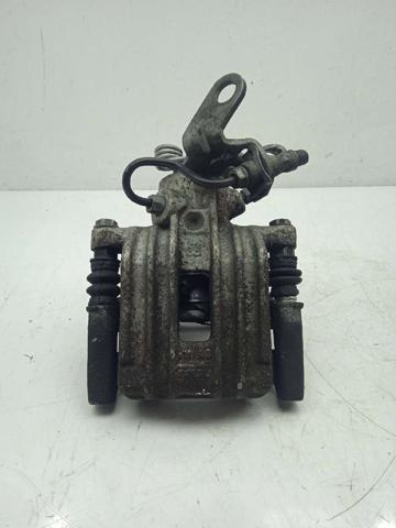 Zacisk hamulcowy tylny lewy 8J0615423E VAG