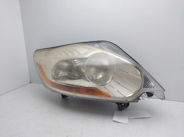 Reflektor prawy 8V4113W029AE FORD
