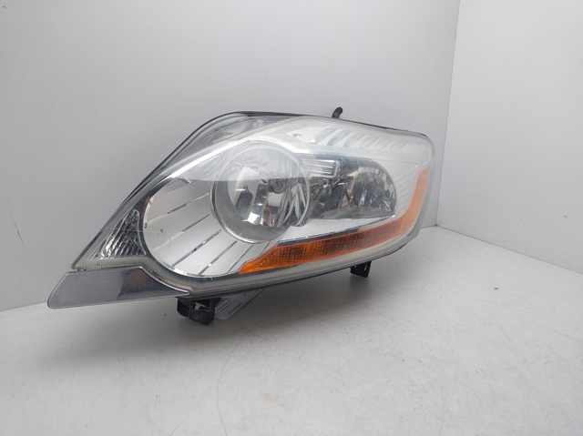 Reflektor lewy 8V4113W030AG FORD