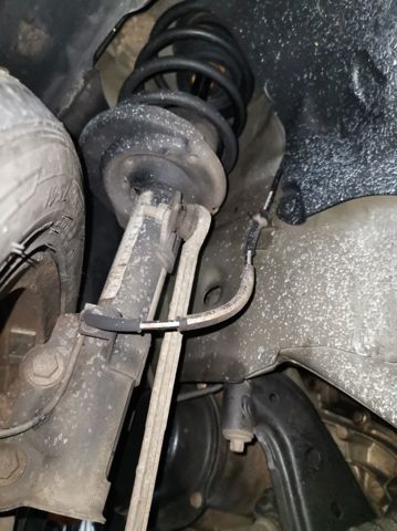 Amortyzator przedni lewy 8V5118K001BF FORD