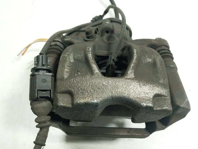 Zacisk hamulcowy tylny prawy 8W0615404 VAG