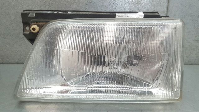 Reflektor lewy 90008019 OPEL