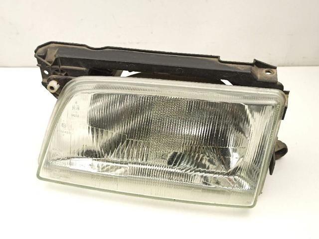 Reflektor lewy 90008019 OPEL