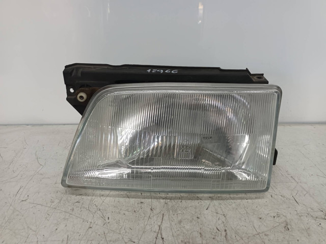 Reflektor lewy 90181002 OPEL