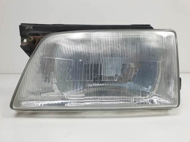Reflektor lewy 90181002 OPEL