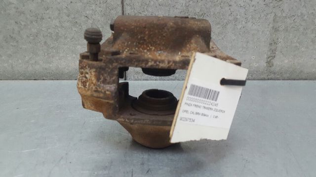 Zacisk hamulcowy tylny lewy 90297534 OPEL