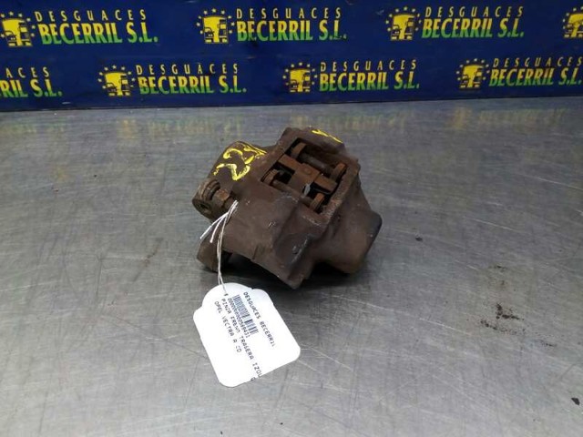 Zacisk hamulcowy tylny lewy 90297534 OPEL