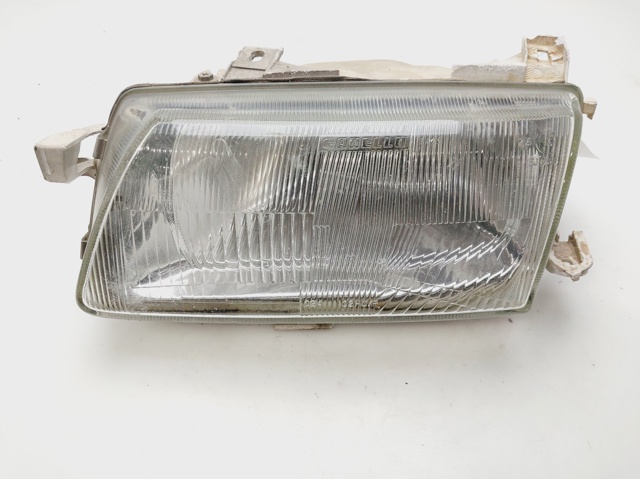 Reflektor lewy 90341849 OPEL
