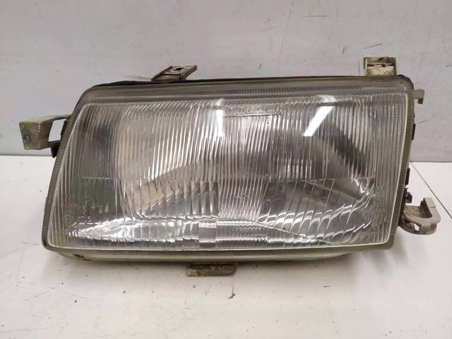 Reflektor lewy 90341849 OPEL