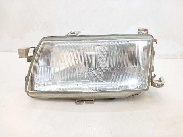 Reflektor lewy 90341849 OPEL
