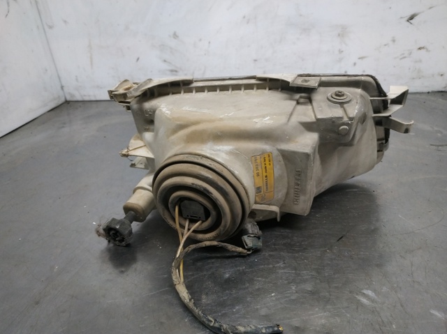 Reflektor lewy 90383786 OPEL
