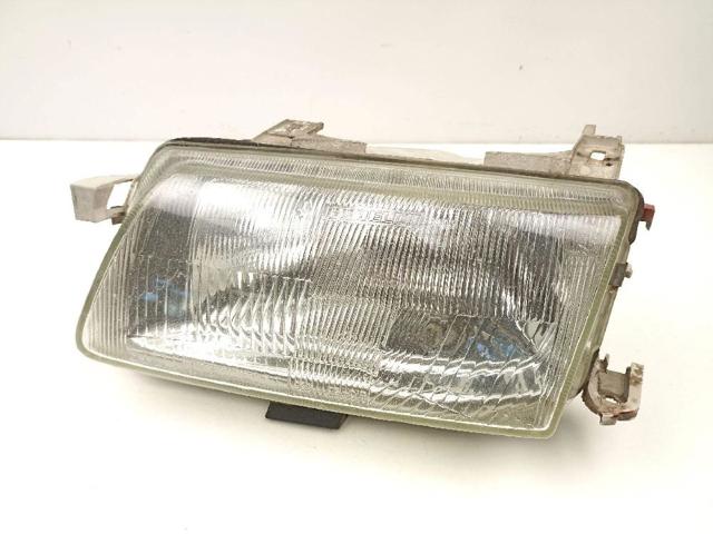 Reflektor lewy 90383786 OPEL