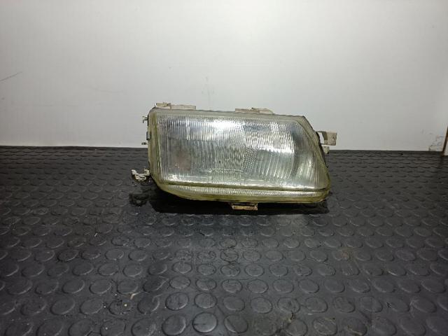 Reflektor lewy 90383786 OPEL
