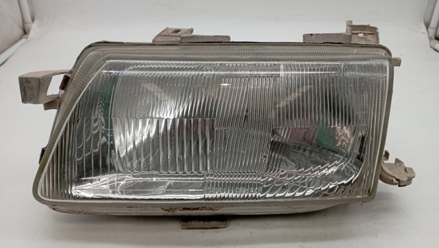 Reflektor lewy 90383786 OPEL