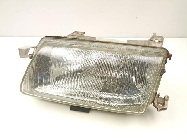 Reflektor lewy 90383786 OPEL
