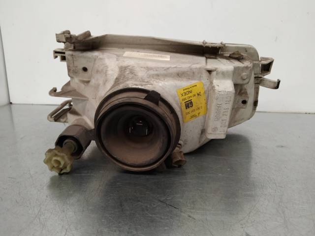 Reflektor lewy 90442389 OPEL