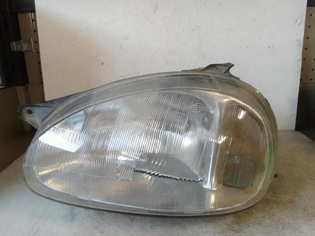 Reflektor lewy 90444784 OPEL