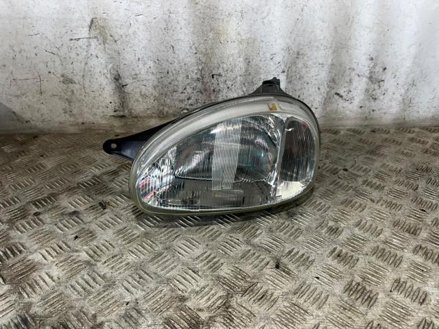 Reflektor lewy 90444784 OPEL