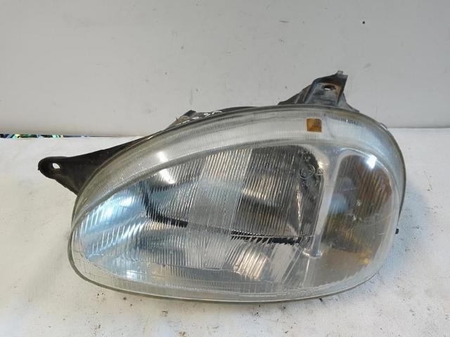 Reflektor lewy 90444784 OPEL