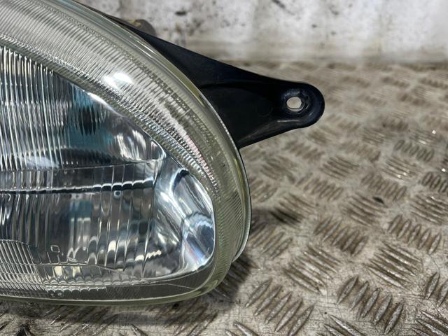 Reflektor prawy 90444785 OPEL