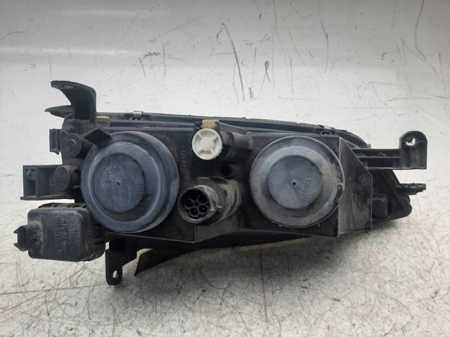 Reflektor lewy 90512318 OPEL