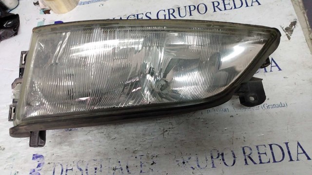 Reflektor lewy 90512318 OPEL