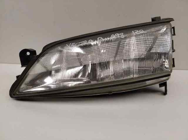 Reflektor lewy 90512318 OPEL