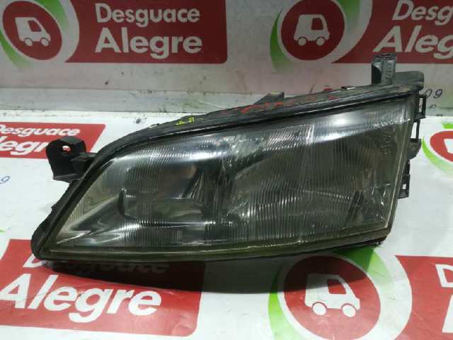 Reflektor lewy 90512318 OPEL