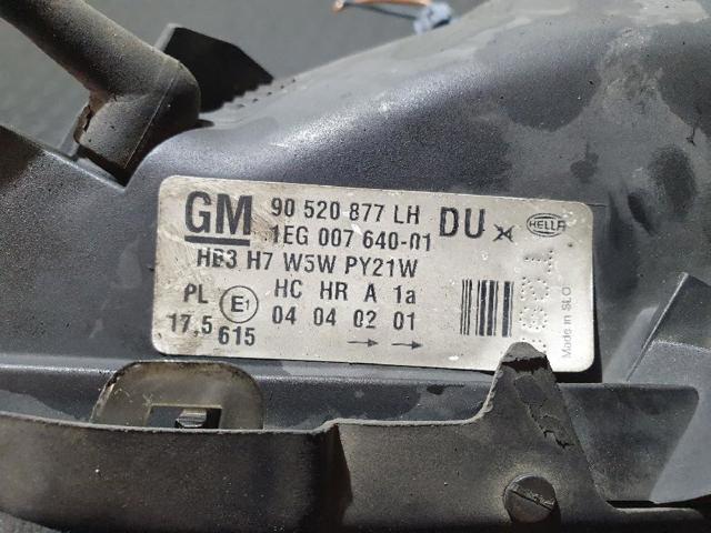 Reflektor lewy 90520877LH OPEL