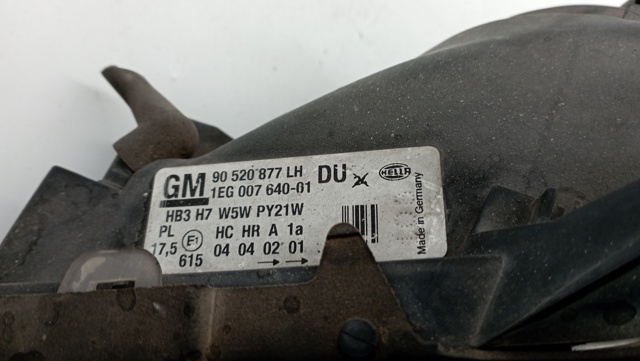 Reflektor lewy 90520877LH OPEL