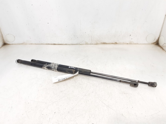 Amortyzator klapy bagażnika (3/5 drzwi-tylnych) 90521517 OPEL
