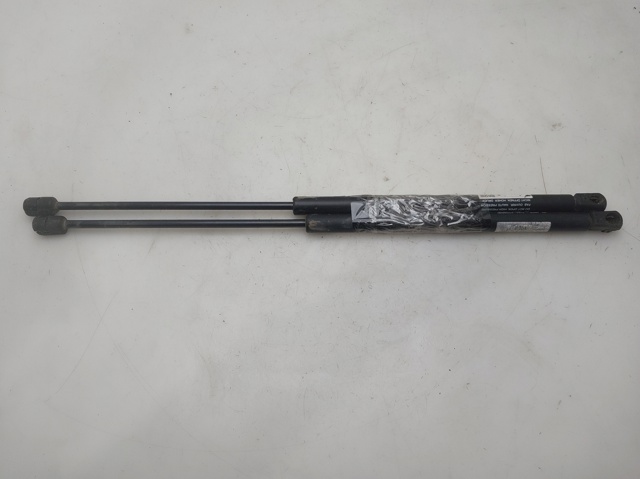 Amortyzator klapy bagażnika (3/5 drzwi-tylnych) 90521517 OPEL