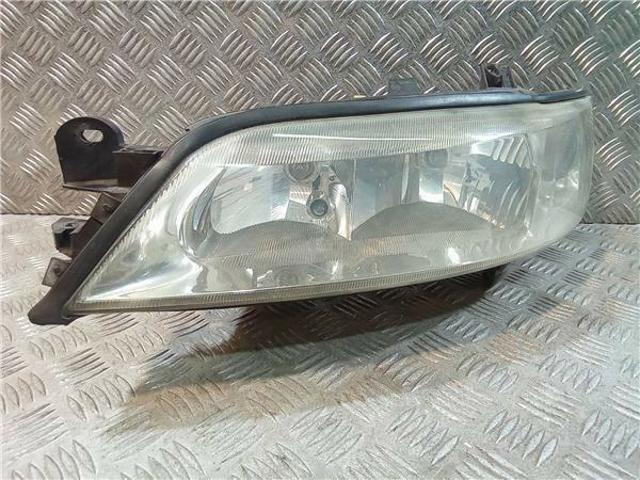 Reflektor lewy 90586844 OPEL