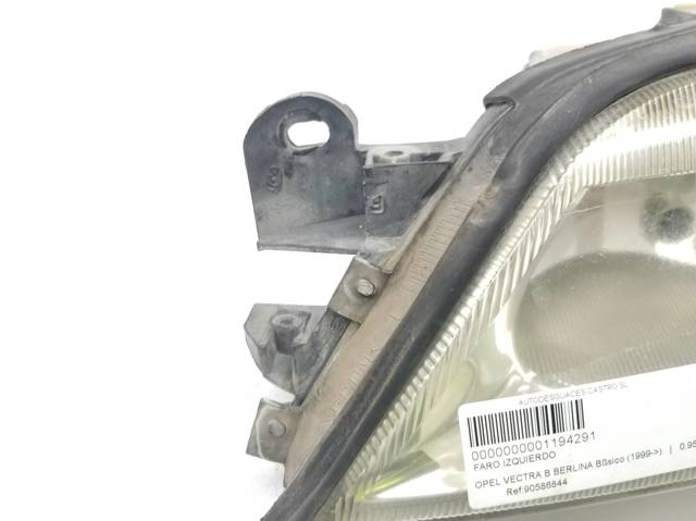 Reflektor lewy 90586844 OPEL